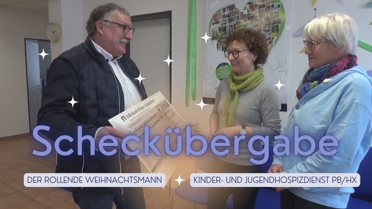 Scheckübergabe vom rollenden Weihnachtsmann